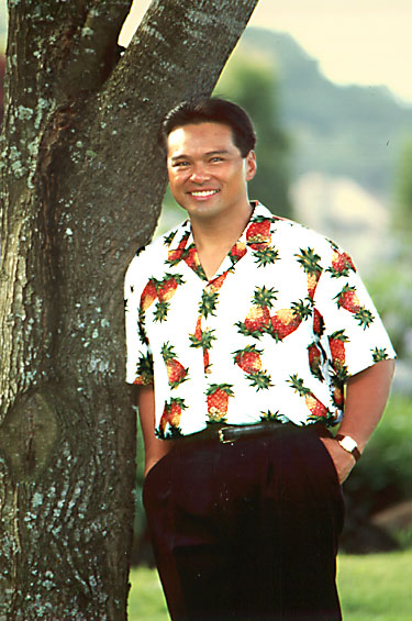 Larry leaning on a tree